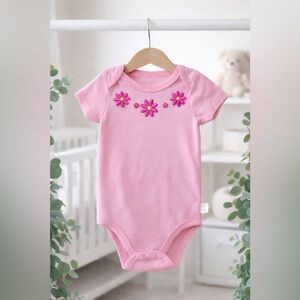 Pink Baby Onesie with Floral design